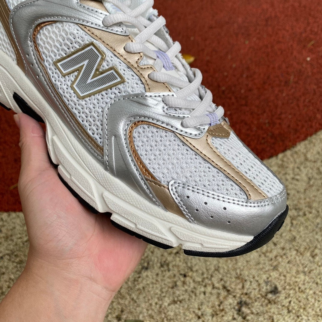 New Balance 530 gold